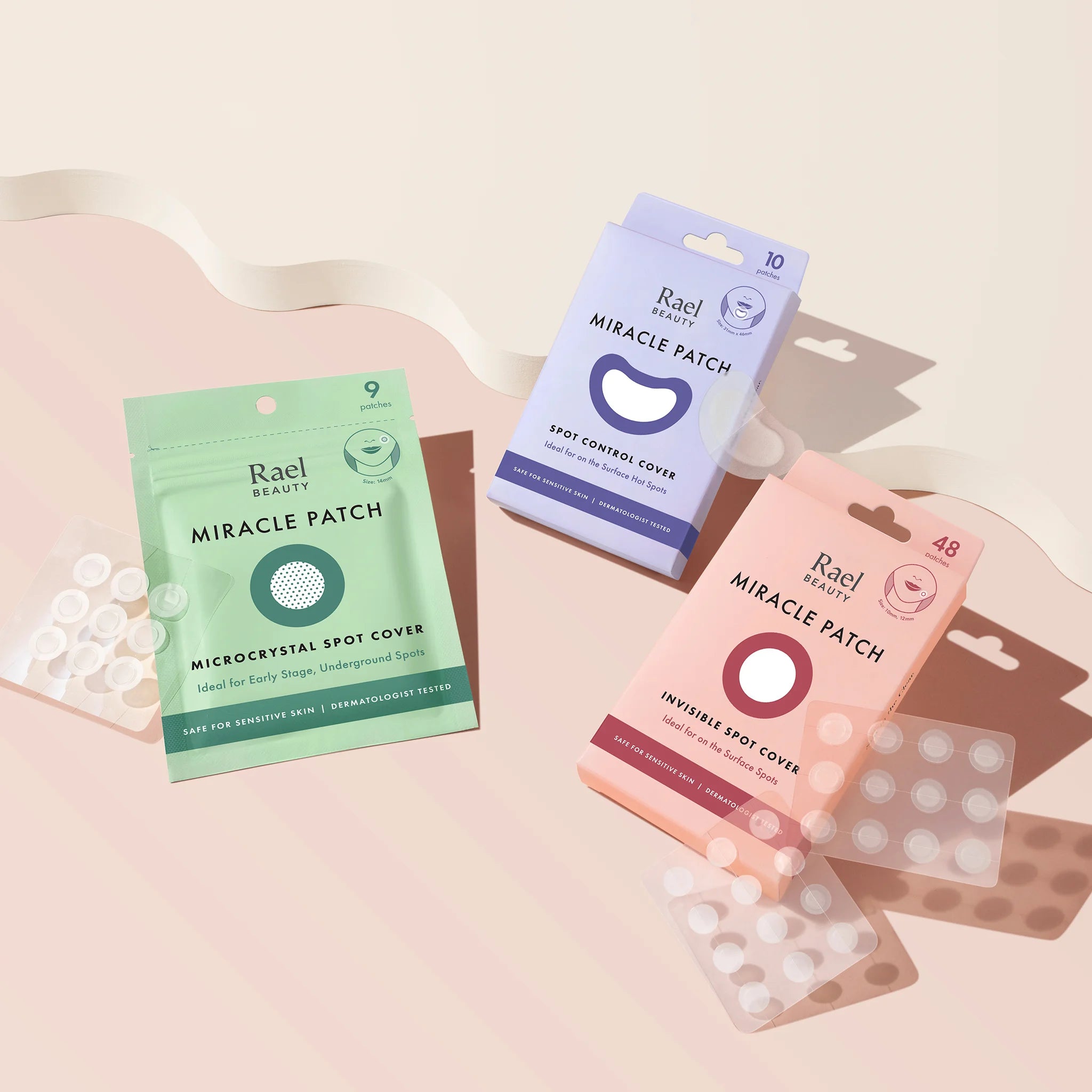 Three packages of Rael Miracle Patch on a light pink background