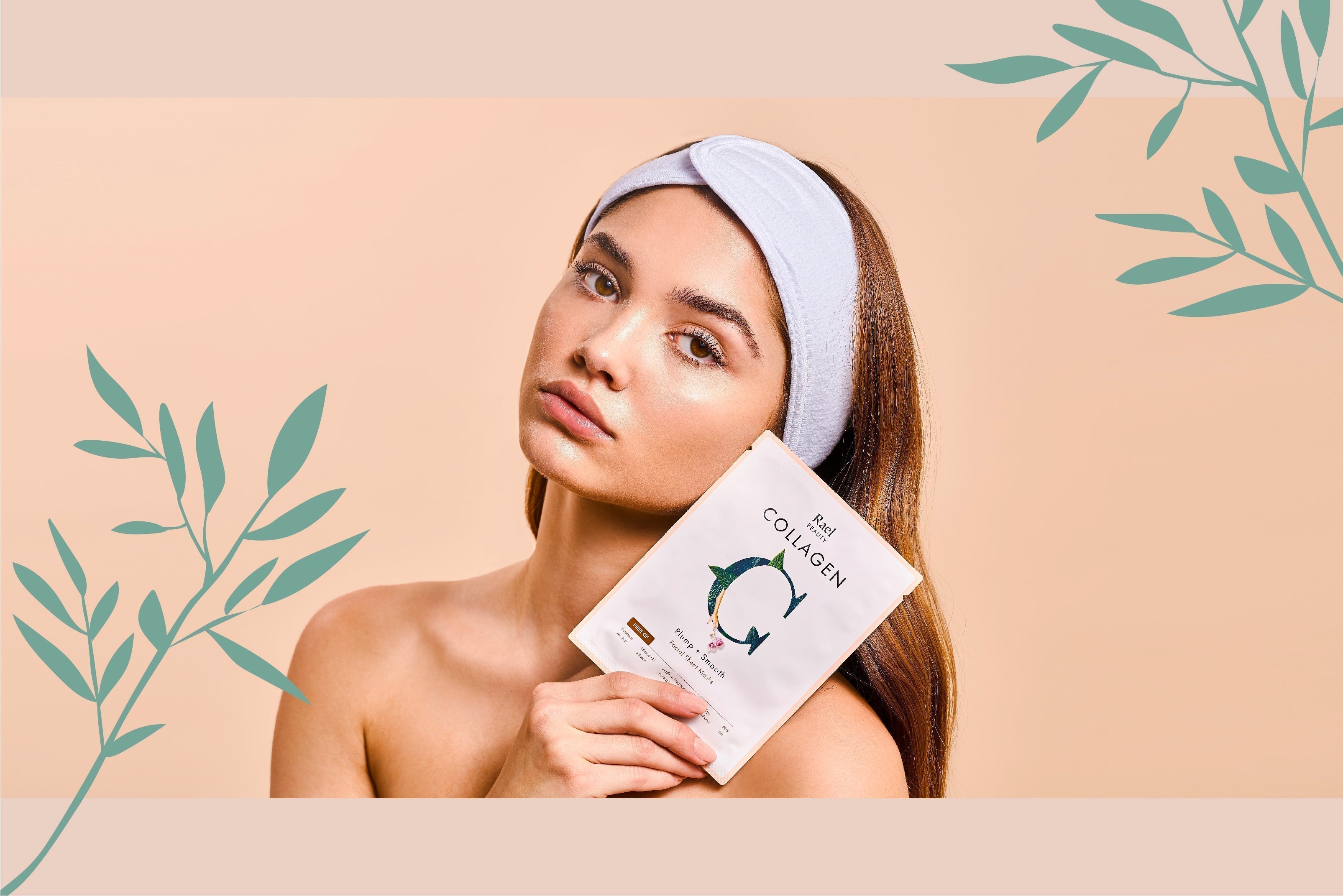 A woman holding a Rael Collagen Mask against a peach colored background with green leaves.
