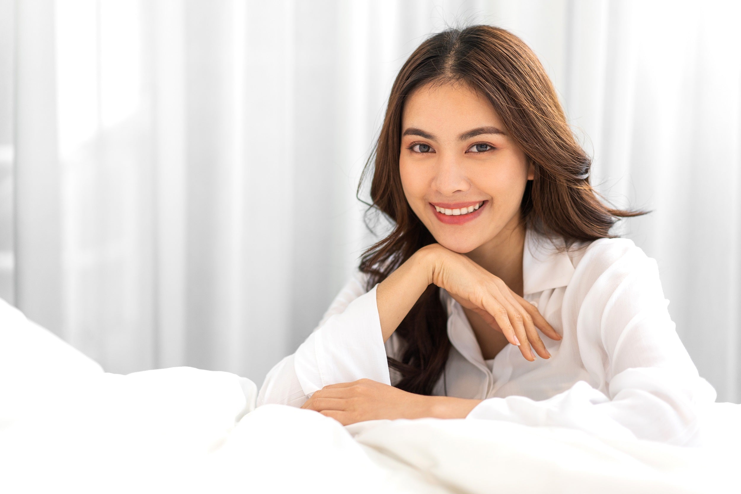 Pretty woman with glowing, clear skin