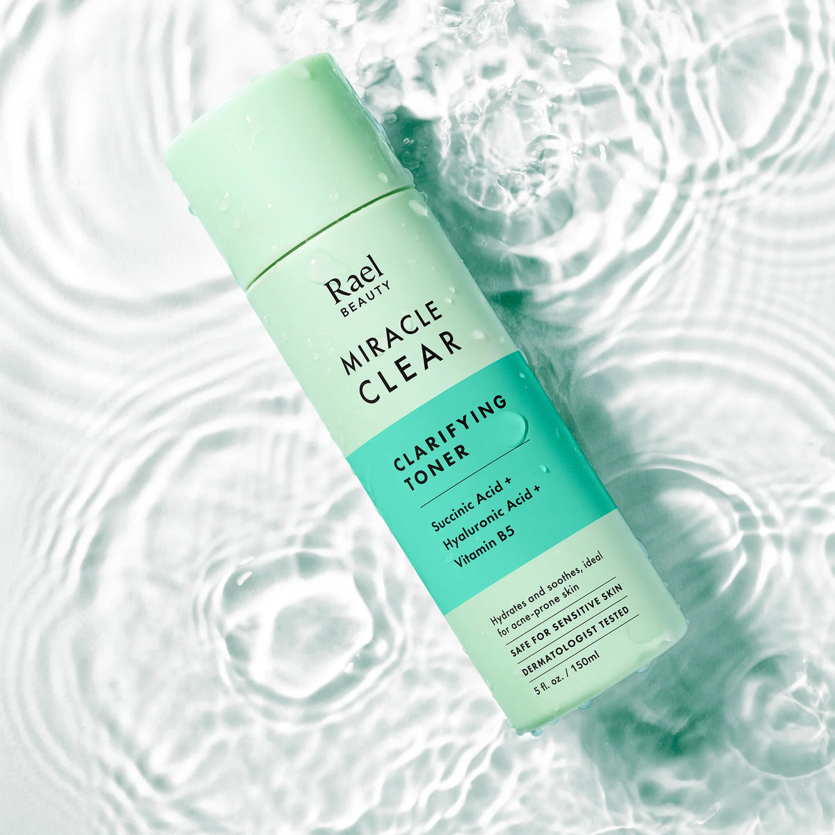 Rael Miracle Clear Clarifying Toner bottle on a water background