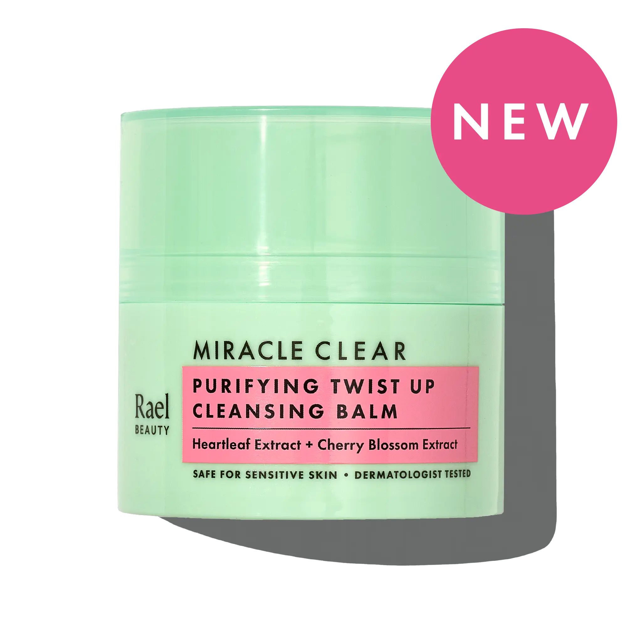 Green jar of 'Miracle Clear' cleansing balm with pink label on a white background