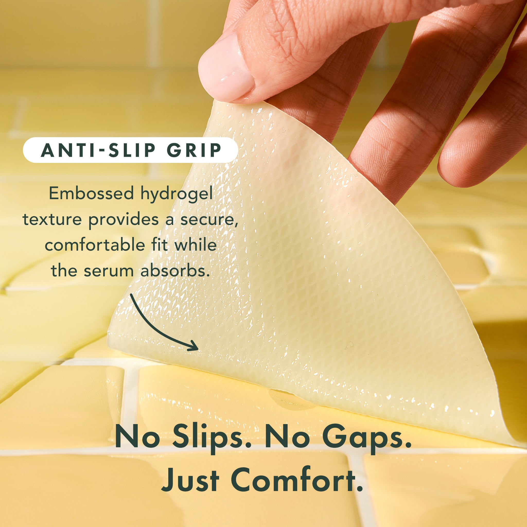Hand holding a hydrogel patch with text highlighting anti-slip grip and comfort.