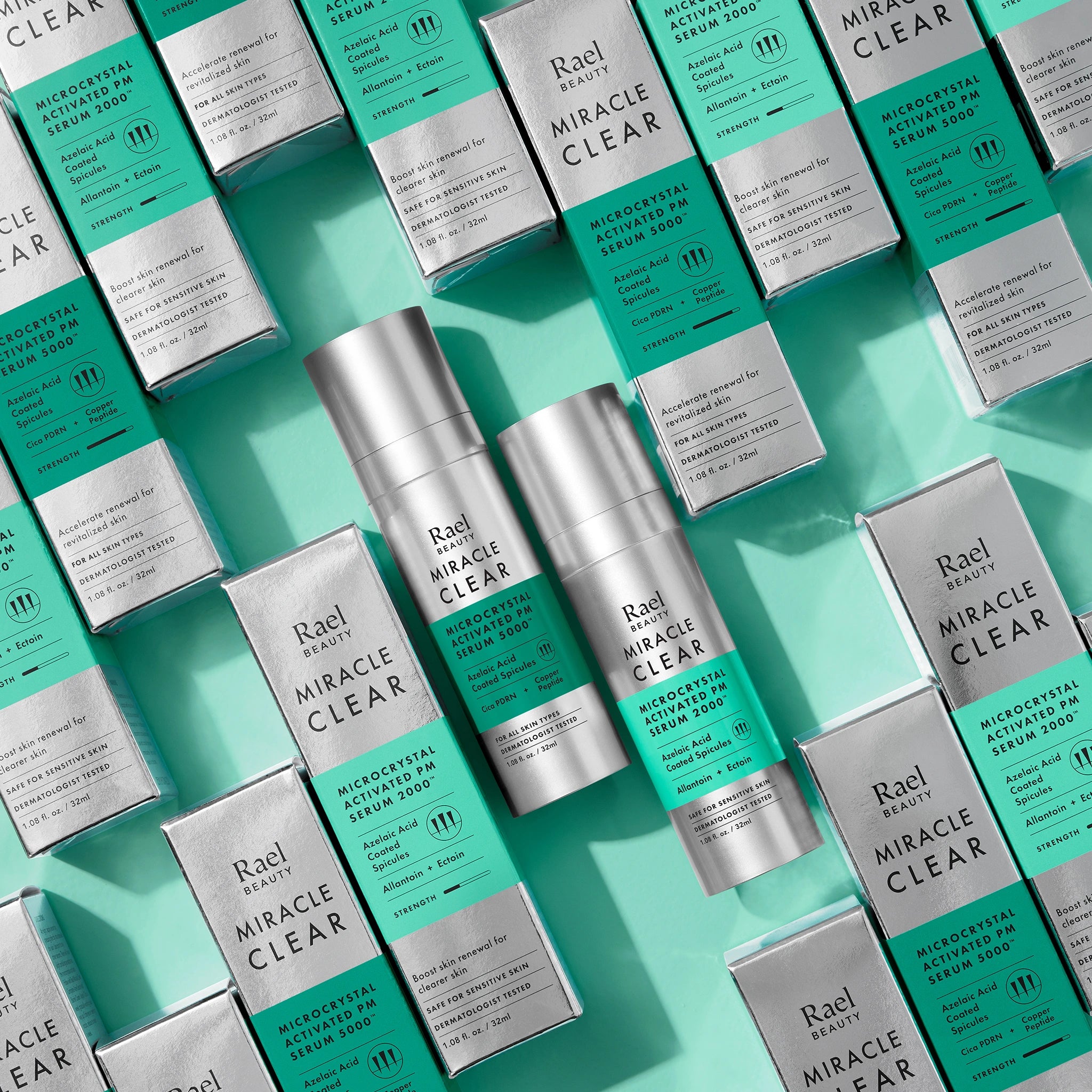 Rael Miracle Clear liquid microneedling serum duo on a teal background