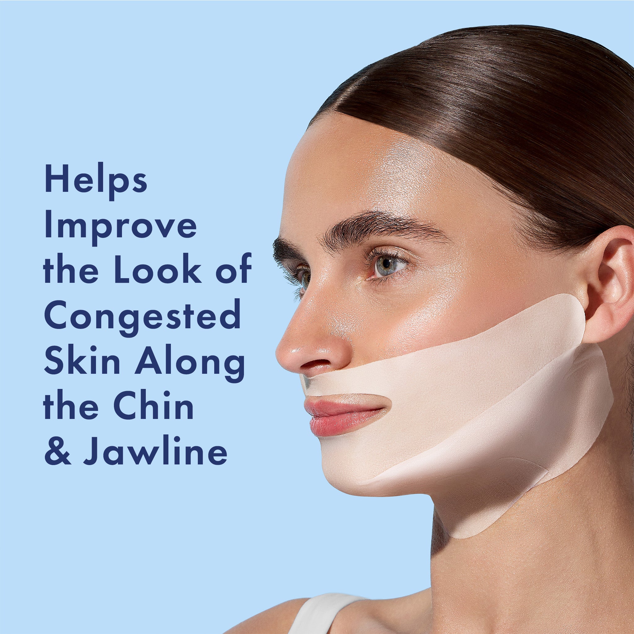 Woman with a skincare product applied to her chin and jawline against a blue background
